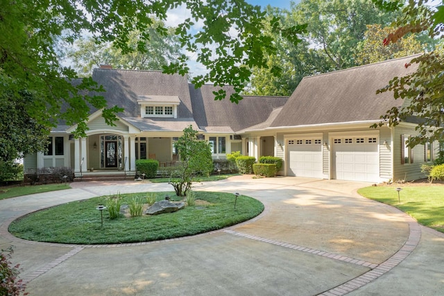 140 Winnstead Pl, Eatonton, GA 31024 - view of front facade featuring an attached garage, concrete driveway, a porch, and roof with shingles