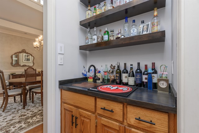 140 Winnstead Pl, Eatonton, GA 31024 - indoor bar with wood finished floors and a chandelier
