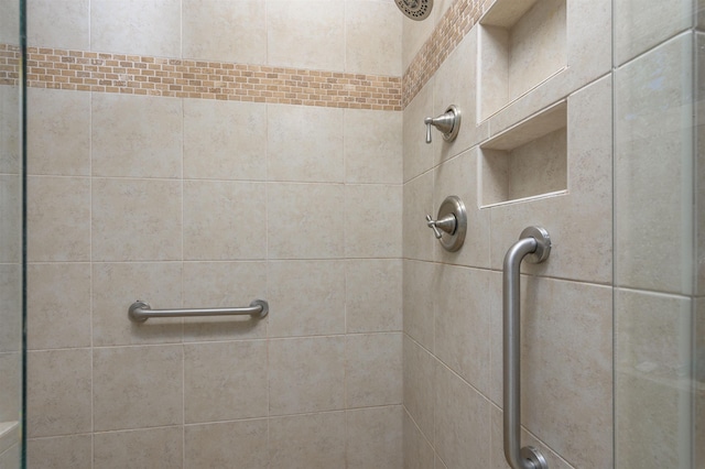 full bath featuring a stall shower