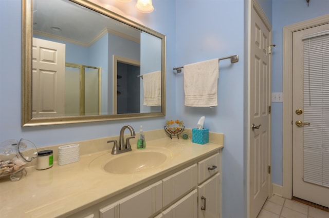 140 Winnstead Pl, Eatonton, GA 31024 - bathroom with vanity, a shower stall, tile patterned floors, and ornamental molding