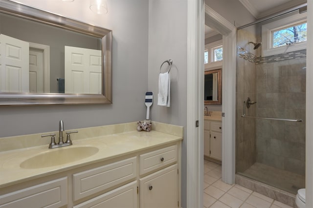 full bathroom featuring tile patterned floors, a shower stall, vanity, and toilet