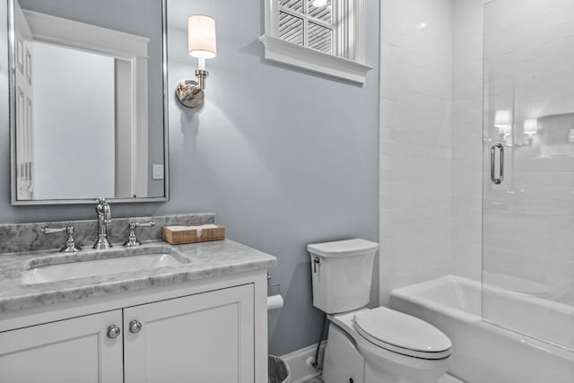 1140 Plantation Point Dr, Greensboro, GA 30642 - full bathroom featuring vanity, baseboards, toilet, and shower / bath combination with glass door