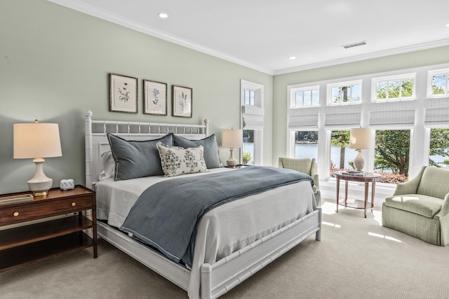 1140 Plantation Point Dr, Greensboro, GA 30642 - carpeted bedroom featuring crown molding, recessed lighting, and visible vents