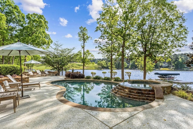 1140 Plantation Point Dr, Greensboro, GA 30642 - view of swimming pool featuring a water view, a patio area, and a pool with connected hot tub