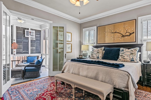 bedroom with access to outside, ornamental molding, wood finished floors, and a ceiling fan