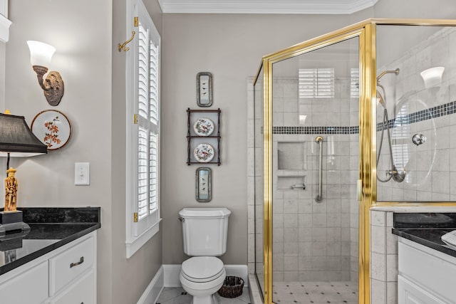 full bath with toilet, a shower stall, crown molding, and vanity