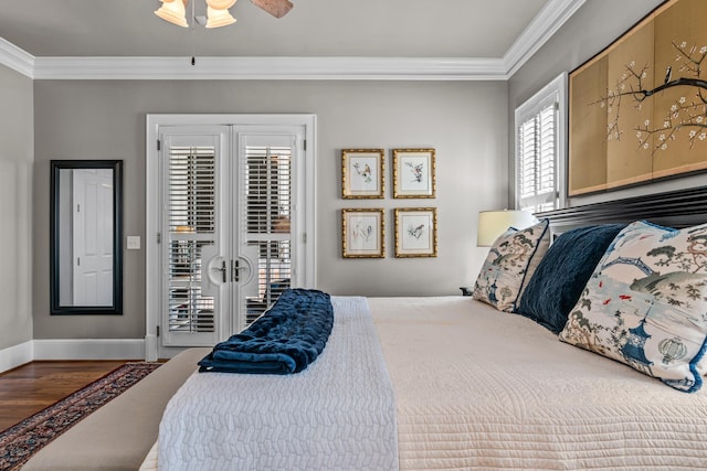 bedroom featuring access to exterior, ornamental molding, wood finished floors, and french doors