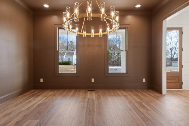 1358 Veranda Park Dr, Madison, GA 30650 - unfurnished room with plenty of natural light, wood finished floors, and baseboards