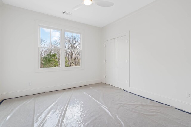 1358 Veranda Park Dr, Madison, GA 30650 - spare room with baseboards, visible vents, and a ceiling fan