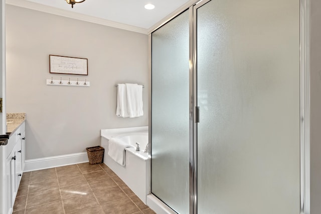 bathroom featuring tile patterned flooring, vanity, separate shower and tub, and ornamental molding