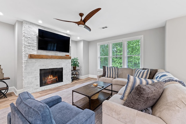1010F Tailwater, Greensboro, GA 30642 - living room featuring ceiling fan, a fireplace, recessed lighting, wood finished floors, and visible vents