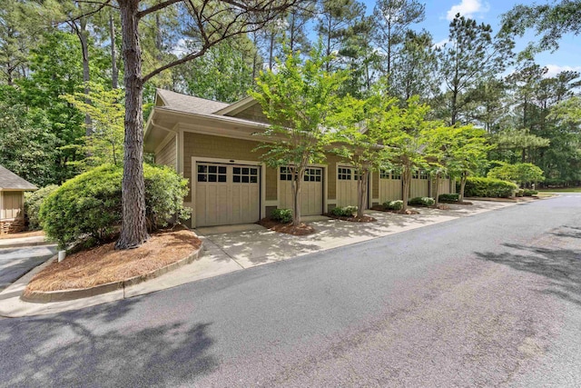 1010F Tailwater, Greensboro, GA 30642 - view of front of property with a garage and concrete driveway