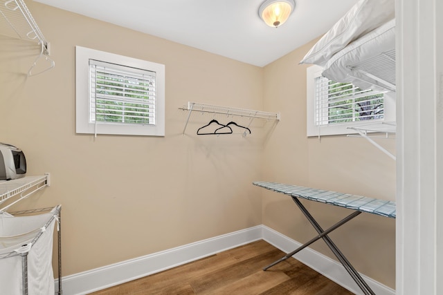 1010F Tailwater, Greensboro, GA 30642 - walk in closet featuring wood finished floors