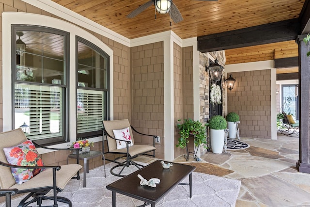 view of patio featuring ceiling fan