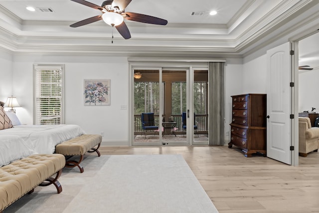 bedroom featuring crown molding, access to outside, and light hardwood / wood-style floors