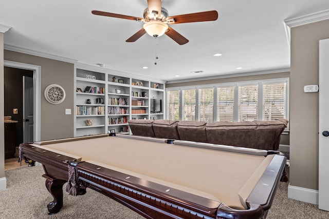 playroom with crown molding, light carpet, and a wealth of natural light