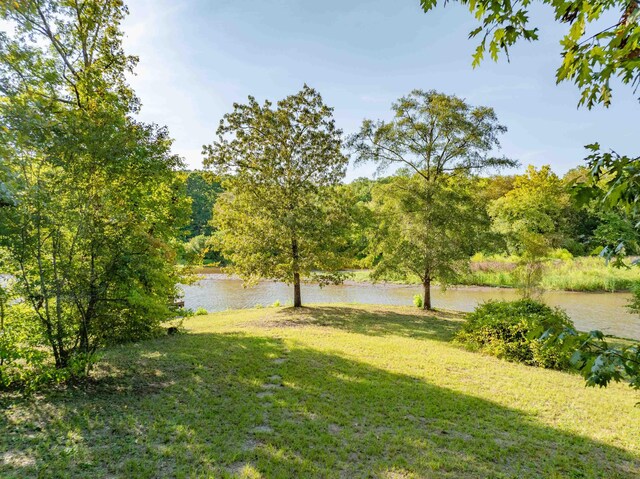 view of yard with a water view