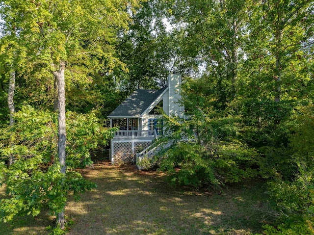 view of yard featuring a porch