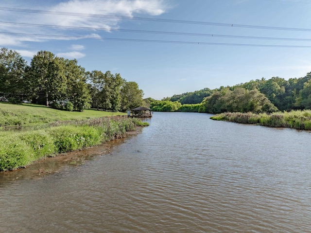 property view of water with a gazebo