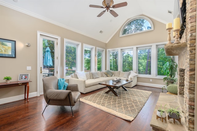 sunroom / solarium with lofted ceiling and ceiling fan