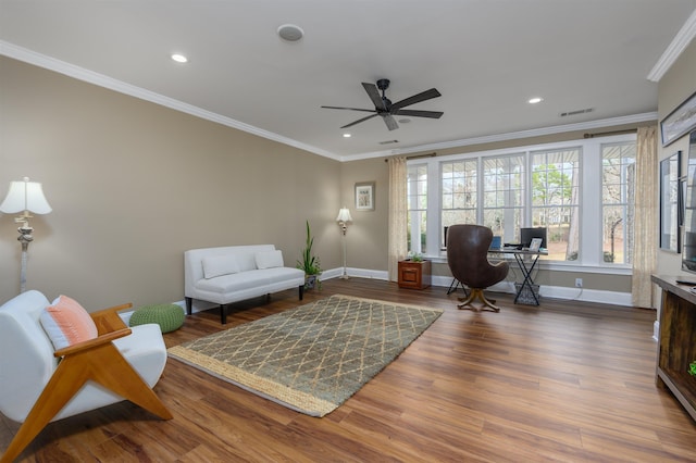 office with hardwood / wood-style flooring, ornamental molding, and ceiling fan