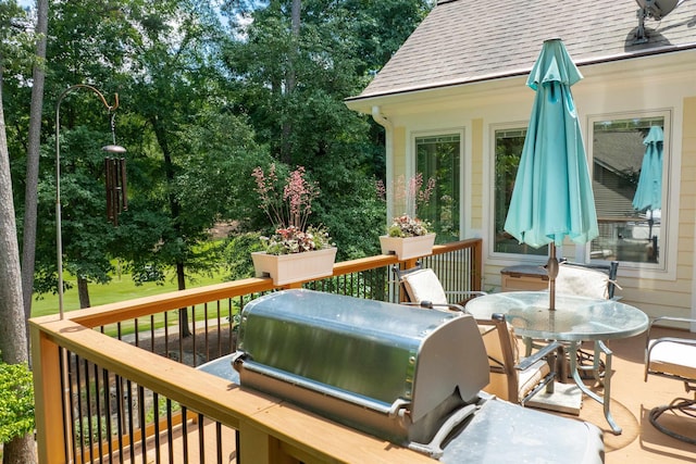 wooden terrace with area for grilling