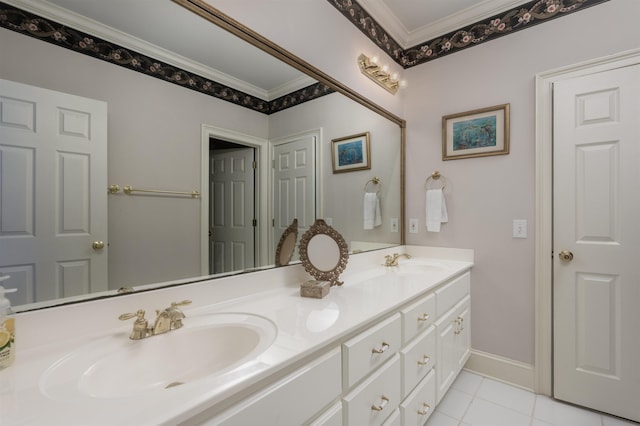 bathroom featuring crown molding, tile patterned floors, and vanity