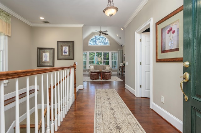 hallway with ornamental molding and dark hardwood / wood-style floors