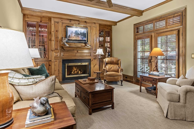 living room with wooden walls, beamed ceiling, carpet flooring, and a glass covered fireplace