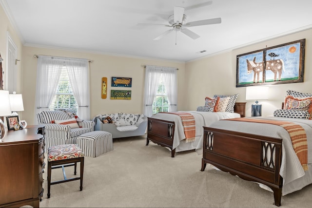 bedroom with light carpet, visible vents, crown molding, and a ceiling fan