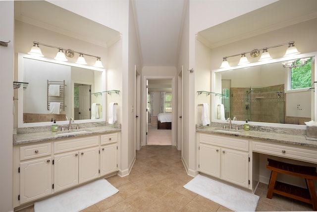 1020 Tallesse Trl, Greensboro, GA 30642 - bathroom featuring a stall shower, crown molding, ensuite bathroom, two vanities, and tile patterned floors