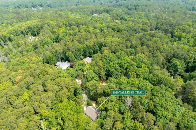 1020 Tallesse Trl, Greensboro, GA 30642 - aerial view of property and surrounding area featuring a heavily wooded area and property boundaries highlighted