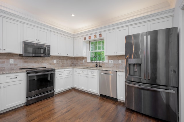 1020 Tallesse Trl, Greensboro, GA 30642 - kitchen featuring stainless steel appliances, a sink, dark wood-style flooring, white cabinetry, and crown molding