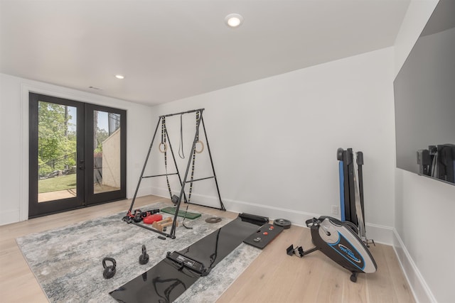 1100 Neary Rdg, Greensboro, GA 30642 - workout room with recessed lighting, wood finished floors, baseboards, and french doors