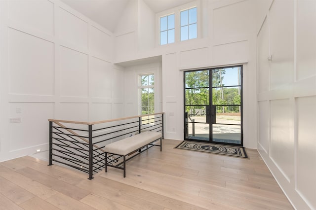 1100 Neary Rdg, Greensboro, GA 30642 - foyer entrance featuring a decorative wall, light wood finished floors, and a high ceiling