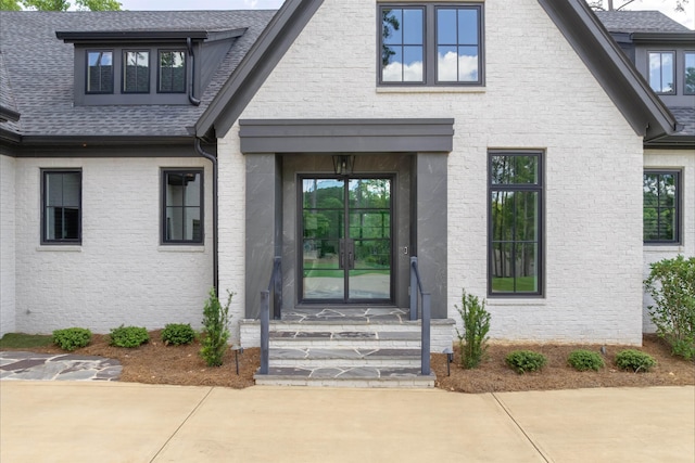 1100 Neary Rdg, Greensboro, GA 30642 - view of exterior entry with brick siding and a shingled roof