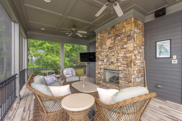 1191 Cory Cir, Greensboro, GA 30642 - wooden deck featuring a ceiling fan and an outdoor living space with a fireplace