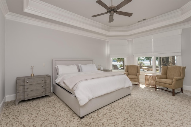 1191 Cory Cir, Greensboro, GA 30642 - carpeted bedroom featuring crown molding, a tray ceiling, a towering ceiling, and ceiling fan