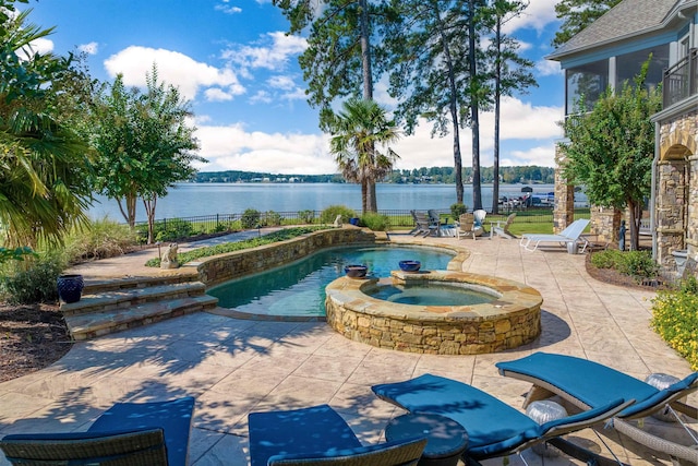 1191 Cory Cir, Greensboro, GA 30642 - view of swimming pool with a water view, a patio, and a pool with connected hot tub