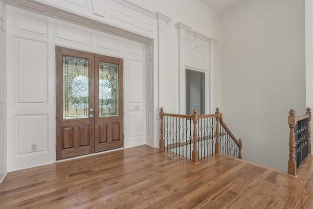 1191 Cory Cir, Greensboro, GA 30642 - entryway featuring wood finished floors, ornamental molding, and french doors