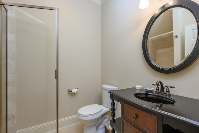 bathroom with vanity, a shower, and toilet