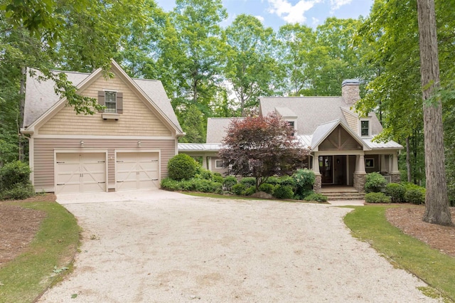 craftsman house with a garage