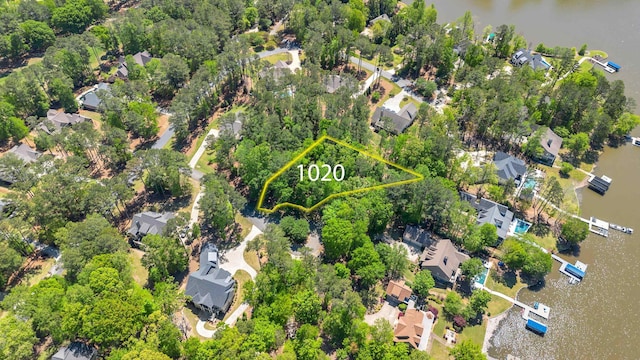 1010 Troon Ct, Greensboro, GA 30642 - aerial view of residential area with a large body of water and property parcel outlined