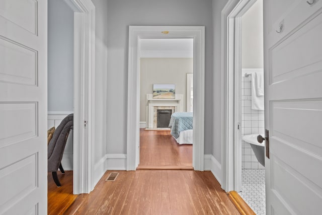 hall featuring wood-type flooring