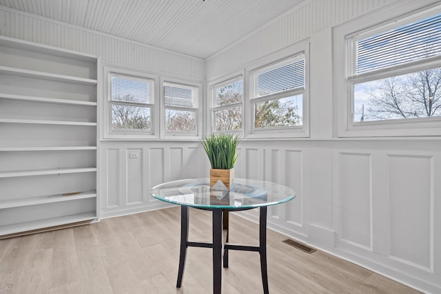 dining space featuring light wood-type flooring