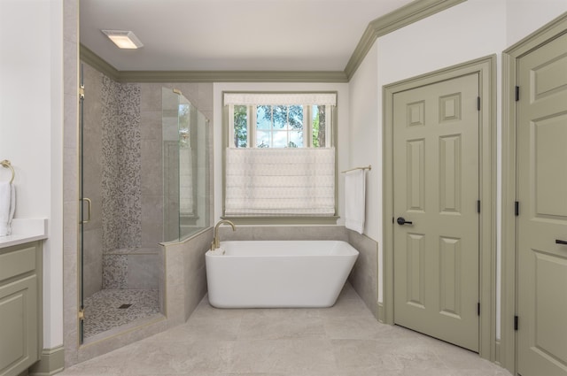 bathroom featuring ornamental molding, independent shower and bath, and vanity