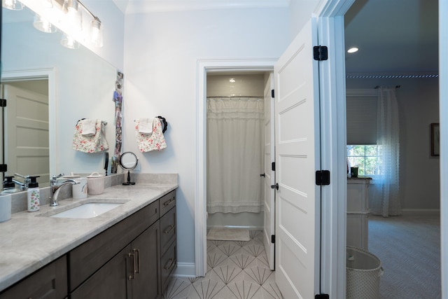 bathroom with a shower with curtain and vanity