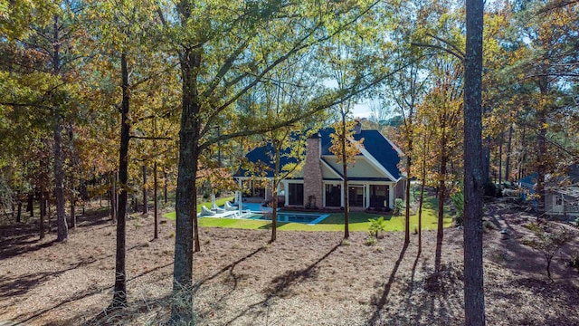 rear view of property with a patio