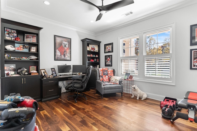 office space featuring crown molding, ceiling fan, and dark hardwood / wood-style floors