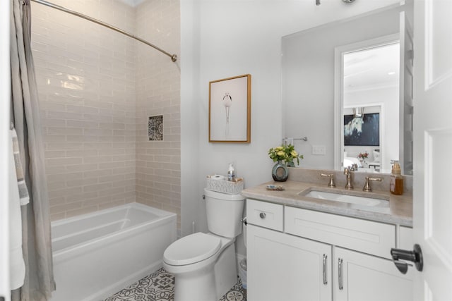 full bathroom featuring vanity, toilet, and tiled shower / bath